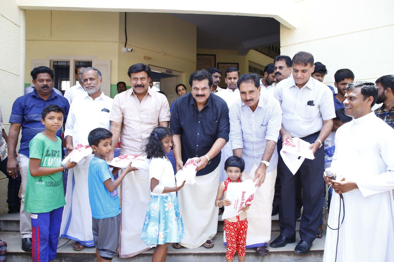 Free Onam kit distribution to flood relief camps in Kollam, joined by MP Premachandran, MLA Mukesh, and MLA Noushad
