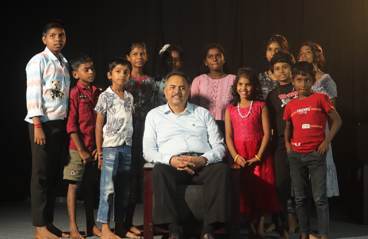 Founder Dr. Mathew Kuruvila sharing joyful moments with our sponsored children